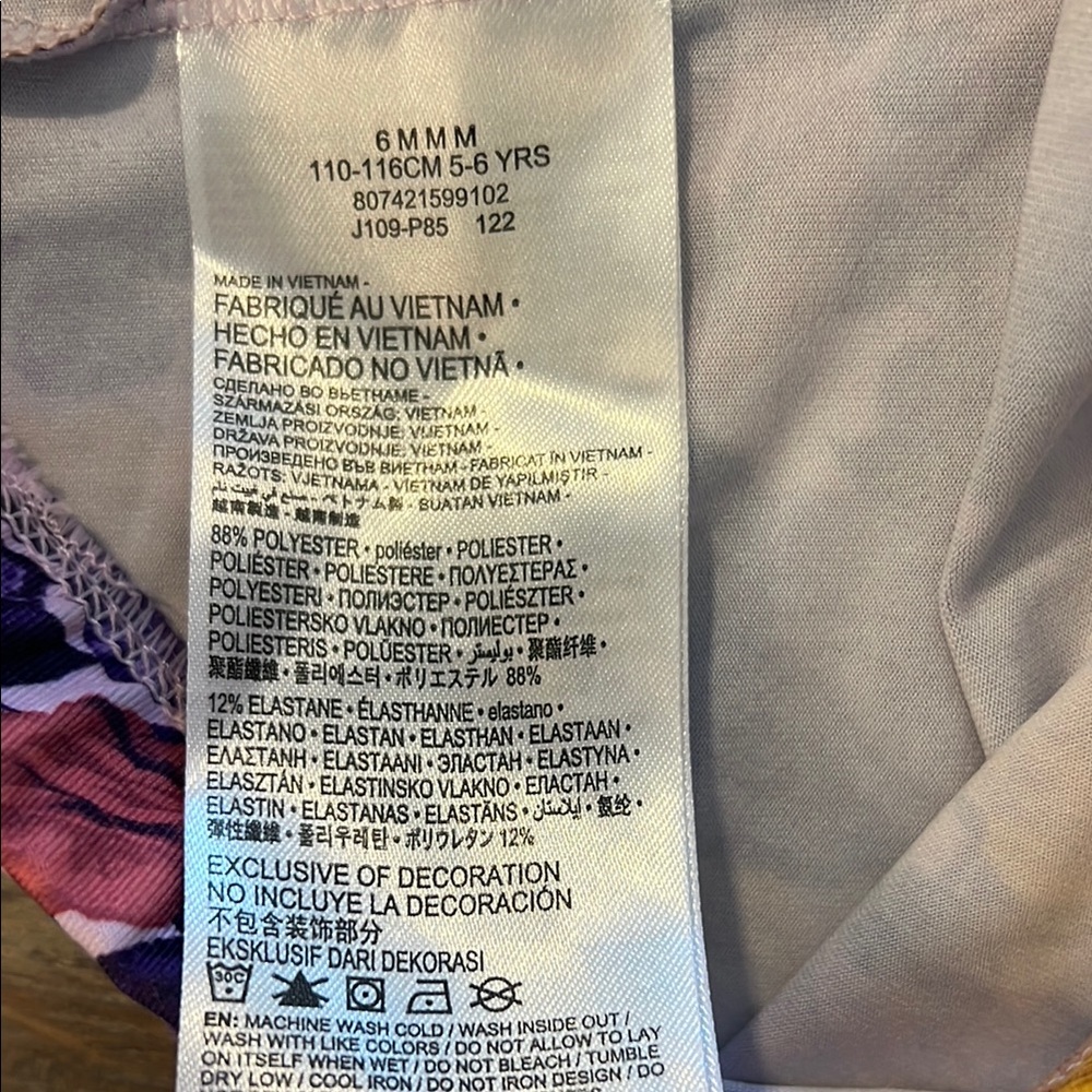 Nike Vibrant Purple and Yellow Floral Dri-fit Leggings - Picture 6 of 6